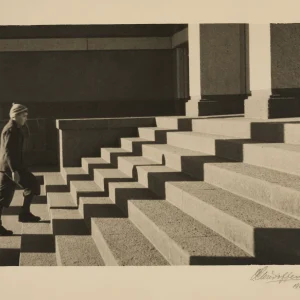 Photograph by Olaf Christoffersen of the steps at Deichman Library, capturing sharp architectural lines, sunlight, and shadows in a modernist style, circa 1930s.