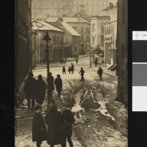 Photograph by Olaf Christoffersen from the 1920s of residents walking along a snowy street in Oslo, with Vika Terrasse’s architecture casting winter shadows.
