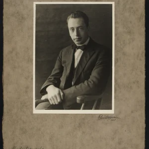 Self-portrait of Olaf Christoffersen from 1924, depicting the young photographer in period attire with an introspective gaze, symbolizing his early artistic journey.